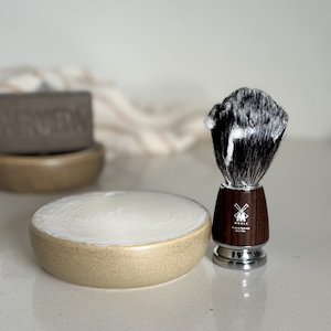 Luxurious goat milk shaving soap in a hand thrown vessel