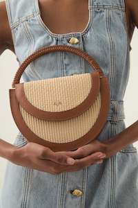 Womenswear: Norma Woven Crescent Clutch