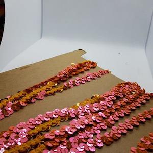 Products: Flo Orange Stretch Sequin Braid – 10mm