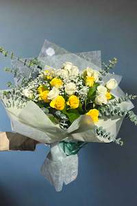 Florist: Yellow & White Roses