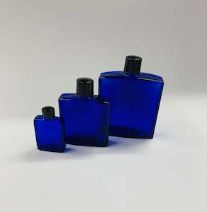 Antique: Set of 3 graduated vintage cobalt blue glass bottles