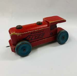 Antique wooden toy train with tin wheels