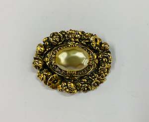 Large vintage gold tone and faux Pearl brooch