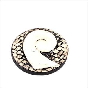 Round ceramic koru decoration - Aotearoa.co.nz