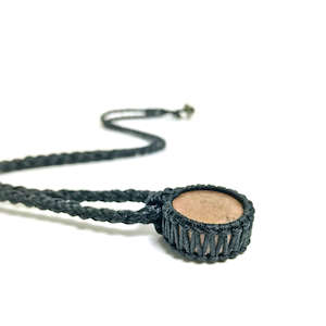 Under 100: Rhodonite Bound Kopae/Disc Pendant