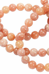 ORANGE ORCHID CALCITE BEAD BRACELET - 8mm