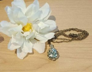 Hollow Flower Diffuser Necklace