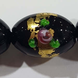 15mm Black Oval Lampwork bead with Florals & Gold Paint