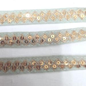 Womenswear: Light Grey gold sequinned Trim