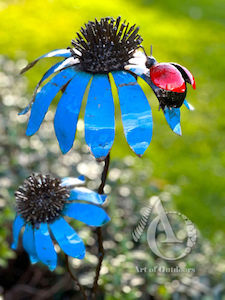 Creative art: Blue Daisy Stem with Ladybug