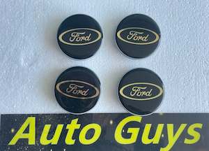 Motor vehicle part dealing - new: Set of 4 Ford Black Blue Badge 62mm Wheel Center Caps