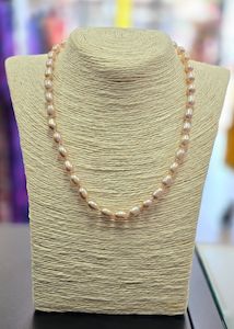 Clothing: Single Strand 6x8mm Oval Pink Freshwater Pearls