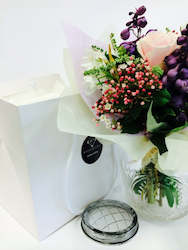 Florist: Vintage glass vase with Posy