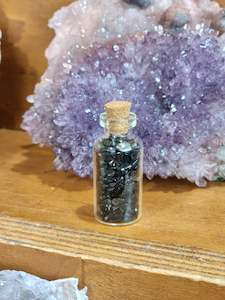 Crystal glass: Obsidian vial