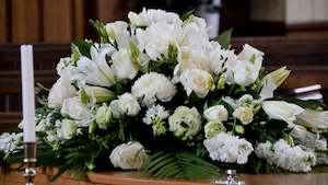 Stunning Casket Spray in Whites & Greens