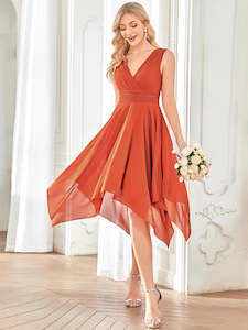 BM2040 Rust. Tea length, V-neck chiffon size 20.