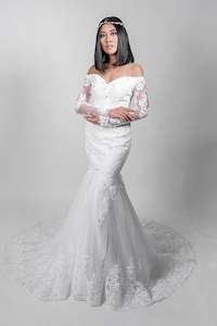 70100. Mermaid with beautiful train and off shoulder sleeves.