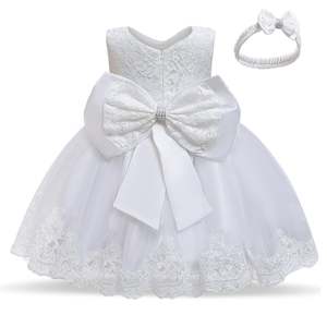 Womenswear: G20260W white flower girl/party dress with matching headband. Age 2