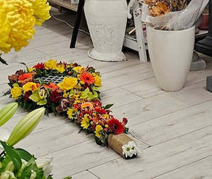 Flower Arrangement Casket Spray, Badminton Racquet