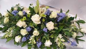 Florist: Flower Arrangement Casket Spray, white, blue, green medium