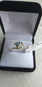 Florist: Ring, Spiral Band Sterling Silver - Blue Topaz