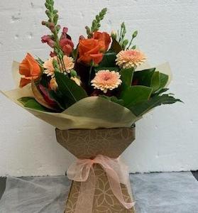 Bright Bunch of Flowers in Water Filled Box