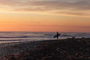 Surfer At Sunrise