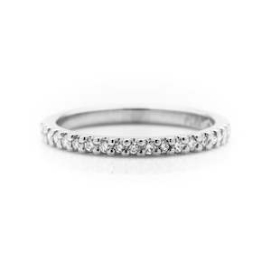 Shared claw platinum diamond wedding ring