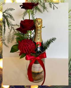 Florist: Moët & Chandon Brut Champagne Festive Arrangement