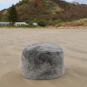 Furniture: SHEEPSKIN OTTOMAN SMALL