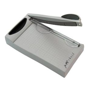 Craft material and supply: Tim Holtz Mini Trimmer - 6.25"