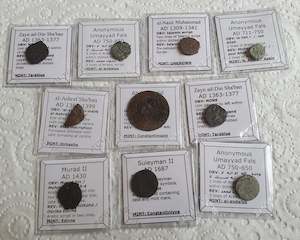 Lot of 10 Identified Islamic bronze coins from 711-1861 AD