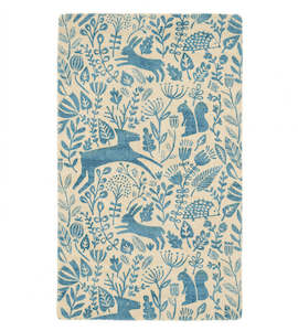 Cream Handloom rug with folksy blue bunnies