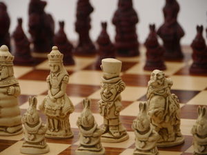 Game: Berkeley Chess Alice in Wonderland Chessmen Cardinal Red