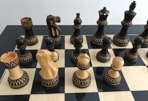 Game: Burnt Boxwood Chess Set with Black Gloss Board. 101mm King