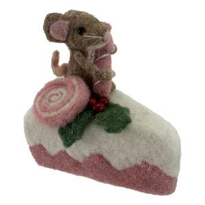 Mouse Sitting on Pink Cake Slice with a Christmas Pudding