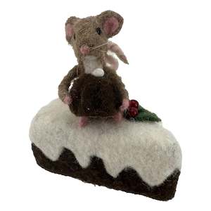 Mouse Sitting on Gingerbread Cake Slice with a Christmas Pudding