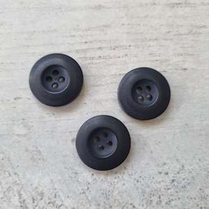 Knitted fabric: Black Buttons 20mm