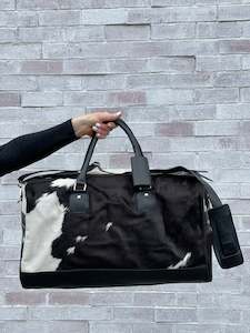 Furniture manufacturing: Cowhide Overnight Bag - Black + White Bold