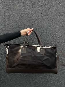 Furniture manufacturing: Cowhide Overnight Bag - Dark Brown + White Bold