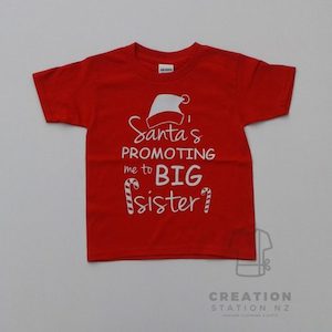 “Santa’s promoting me to big sister” tee