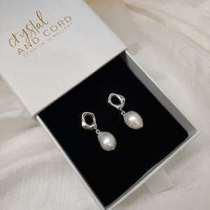 Haisley - silver or gold tone oval hoop and pearl drop earrings