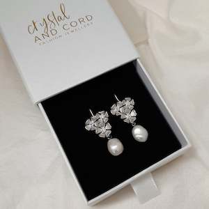 Maia - silver-tone triple flower rhinestone centered pearl drop earrings