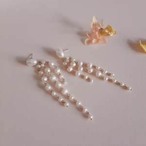 Linelle - freshwater pearls oval stud and tapered multi cascading earrings