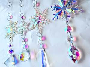 Jewellery: Set of Four Snowflake Sun Catchers.