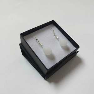 Earrings: Wearing Glass Sea Drops Milk White