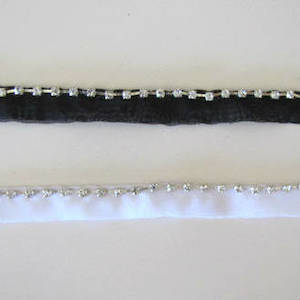 Crystals on white or black fabric trim