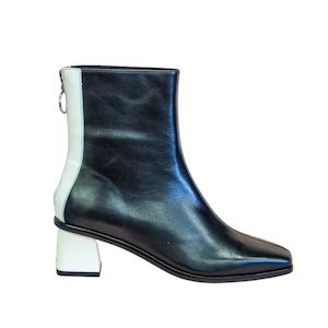 Womenswear: Belle Scarp Rivka Boots - Black/White