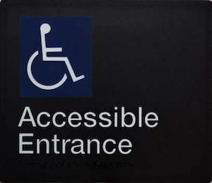 Black PVC Braille Signs: Accessible Entrance Sign Black Wheelchair Icon (Braille)