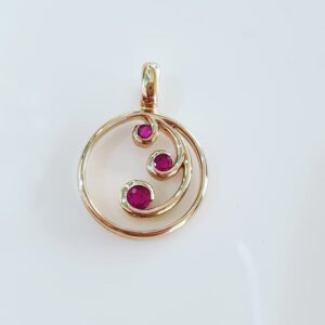 9ct Gold 3 stone Ruby pendant